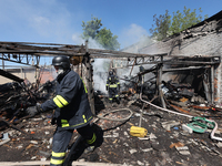 Rescuers are dealing with the aftermath of a Russian KAB aerial bomb attack in Kharkiv, northeastern Ukraine, on April 30, 2024. (