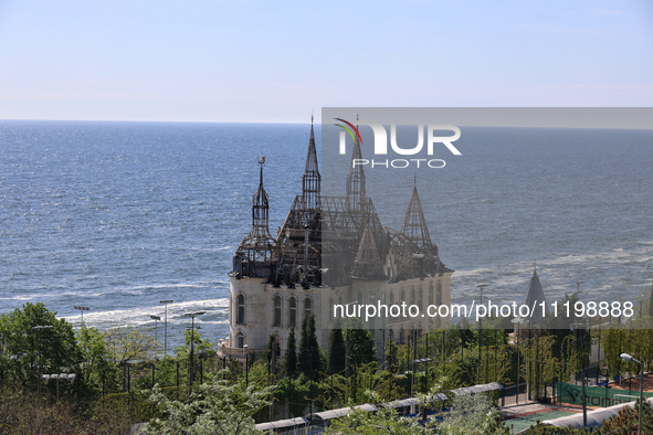 A Russian missile strike's aftermath is being observed on the waterfront in Odesa, Ukraine, on April 30, 2024, following the incident that o...