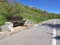 A spot of dried blood is visible on a bench in Odesa, Ukraine, on April 30, 2024, where a woman died due to a Russian missile strike on the...