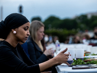 Rep. Ilhan Omar (D-MN) participates in a Passover Seder on the lawn of the U.S. Capitol, hosted by Jewish organizations advocating a ceasefi...