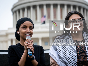 Rep. Ilhan Omar (D-MN) (left) and Rep. Rashida Tlaib (D-MI) participate in a Passover Seder on the U.S. Capitol lawn hosted by Jewish organi...