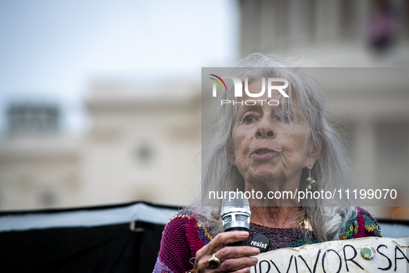 Holocaust survivor Marione Ingram speaks at a Passover Seder on the U.S. Capitol lawn hosted by Jewish organizations advocating a ceasefire...