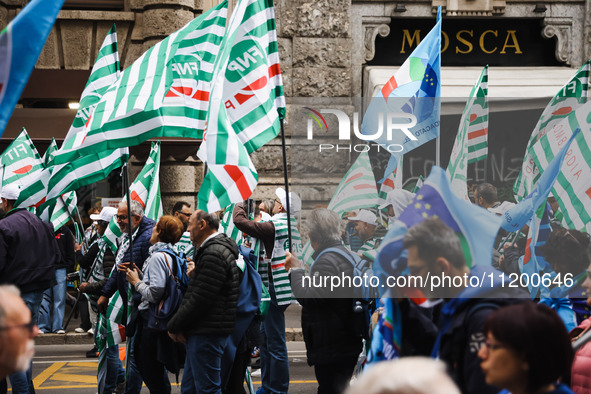 Demonstrators are gathering for the Primo Maggio demonstration in Piazza San Babila in Milan, Italy, on May 1, 2024. 