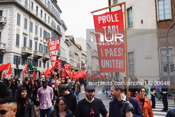 Demonstrators are gathering for the Primo Maggio demonstration in Piazza San Babila in Milan, Italy, on May 1, 2024. 