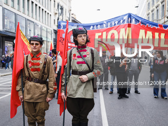 Demonstrators are gathering for the Primo Maggio demonstration in Piazza San Babila in Milan, Italy, on May 1, 2024. (