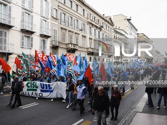 Demonstrators are gathering for the Primo Maggio demonstration in Piazza San Babila in Milan, Italy, on May 1, 2024. (