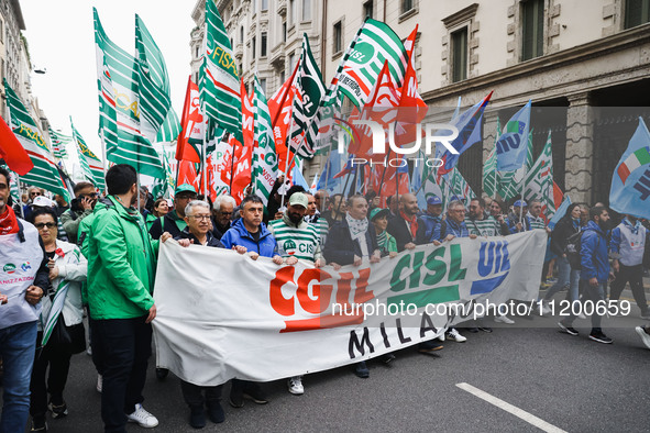 Demonstrators are gathering for the Primo Maggio demonstration in Piazza San Babila in Milan, Italy, on May 1, 2024. 