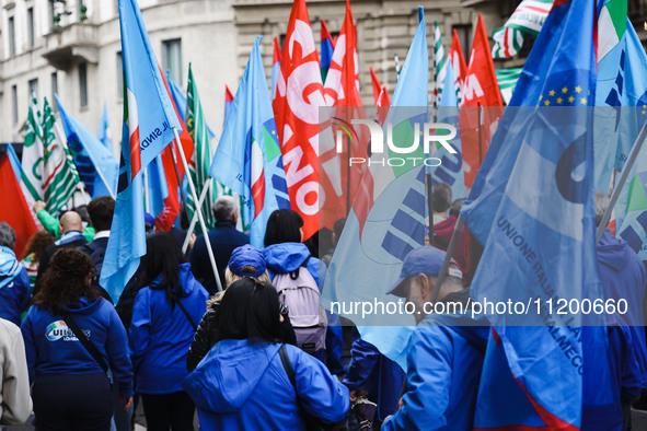 Demonstrators are gathering for the Primo Maggio demonstration in Piazza San Babila in Milan, Italy, on May 1, 2024. 