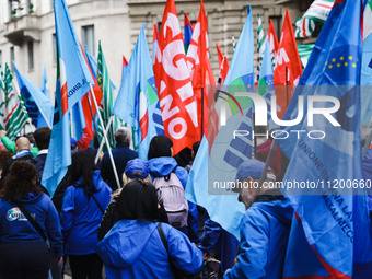 Demonstrators are gathering for the Primo Maggio demonstration in Piazza San Babila in Milan, Italy, on May 1, 2024. (