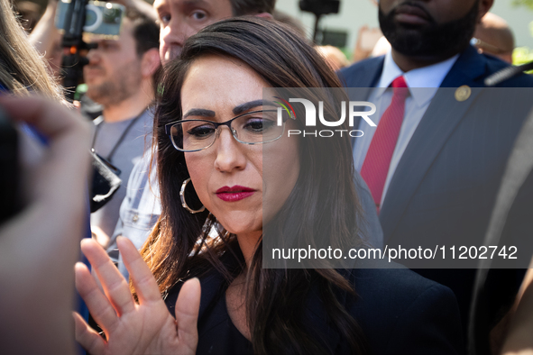 Rep. Lauren Boebert (R-CO) speaks to the reporters as she and other far-right Republican members of the House Oversight Committee visit the...