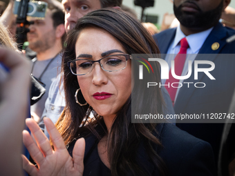 Rep. Lauren Boebert (R-CO) speaks to the reporters as she and other far-right Republican members of the House Oversight Committee visit the...