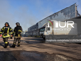 Rescuers are responding to a Russian ballistic missile strike on a Nova Poshta depot and cargo branch in Odesa, Ukraine, on May 2, 2024. The...