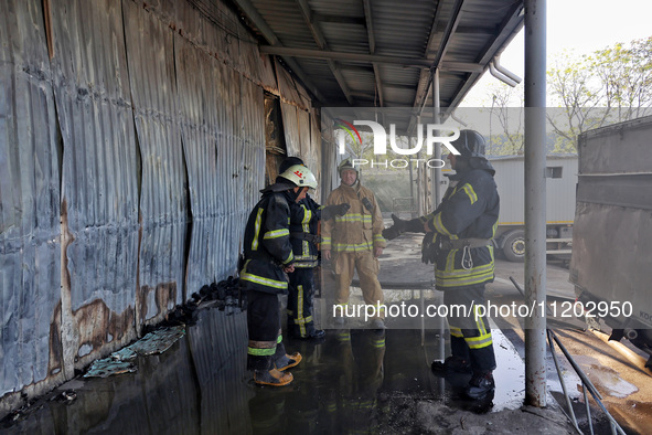 Rescuers are responding to a Russian ballistic missile strike on a Nova Poshta depot and cargo branch in Odesa, Ukraine, on May 2, 2024. The...