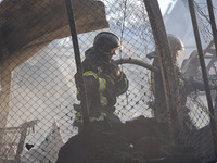 Rescuers are responding to a Russian ballistic missile strike on a Nova Poshta depot and cargo branch in Odesa, Ukraine, on May 2, 2024. The...