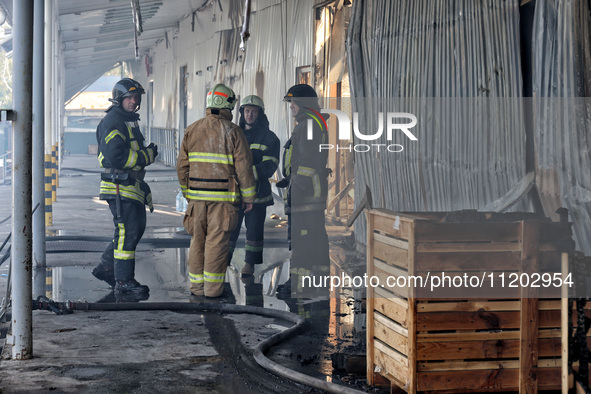 Rescuers are responding to a Russian ballistic missile strike on a Nova Poshta depot and cargo branch in Odesa, Ukraine, on May 2, 2024. The...