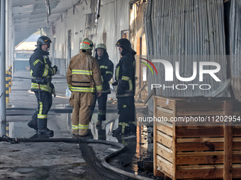 Rescuers are responding to a Russian ballistic missile strike on a Nova Poshta depot and cargo branch in Odesa, Ukraine, on May 2, 2024. The...