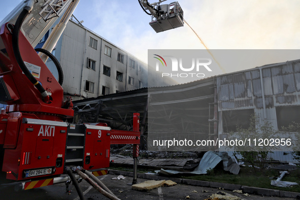 Rescuers are responding to a Russian ballistic missile strike on a Nova Poshta depot and cargo branch in Odesa, Ukraine, on May 2, 2024. The...