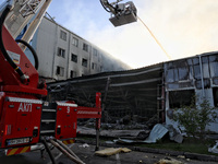 Rescuers are responding to a Russian ballistic missile strike on a Nova Poshta depot and cargo branch in Odesa, Ukraine, on May 2, 2024. The...