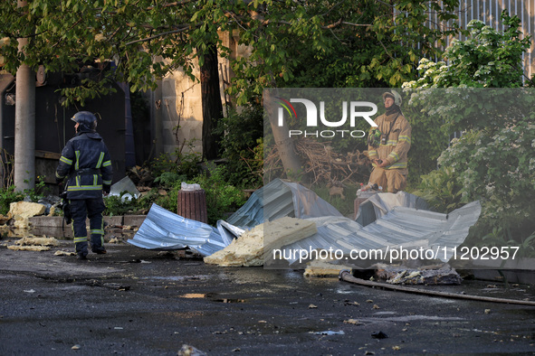 Rescuers are responding to a Russian ballistic missile strike on a Nova Poshta depot and cargo branch in Odesa, Ukraine, on May 2, 2024. The...