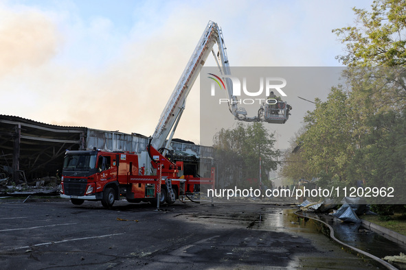 Rescuers are responding to a Russian ballistic missile strike on a Nova Poshta depot and cargo branch in Odesa, Ukraine, on May 2, 2024. The...