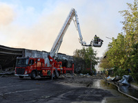 Rescuers are responding to a Russian ballistic missile strike on a Nova Poshta depot and cargo branch in Odesa, Ukraine, on May 2, 2024. The...