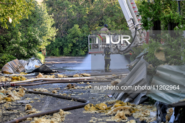 Rescuers are responding to a Russian ballistic missile strike on a Nova Poshta depot and cargo branch in Odesa, Ukraine, on May 2, 2024. The...