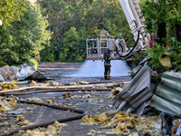 Rescuers are responding to a Russian ballistic missile strike on a Nova Poshta depot and cargo branch in Odesa, Ukraine, on May 2, 2024. The...