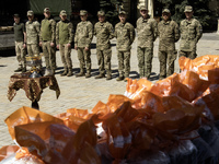 Ukrainian soldiers are attending an Orthodox service before delivering Easter cakes to their fellow servicemen at the front for Orthodox Eas...