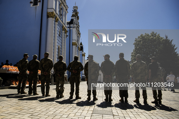 Ukrainian soldiers are attending an Orthodox service before delivering Easter cakes to their fellow servicemen at the front for Orthodox Eas...