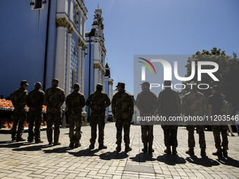 Ukrainian soldiers are attending an Orthodox service before delivering Easter cakes to their fellow servicemen at the front for Orthodox Eas...