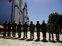 Ukrainian soldiers are attending an Orthodox service before delivering Easter cakes to their fellow servicemen at the front for Orthodox Eas...