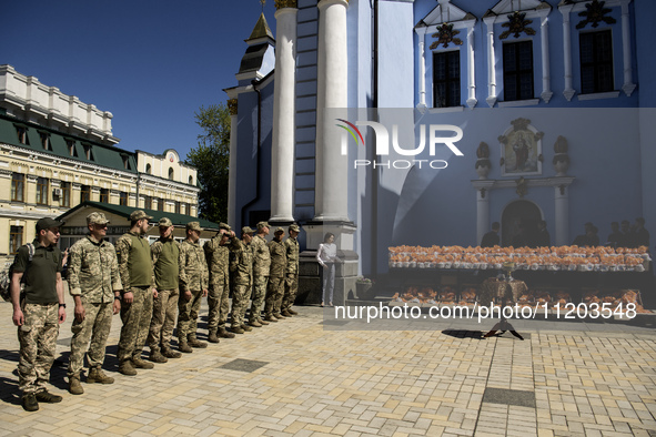 Ukrainian soldiers are attending an Orthodox service before delivering Easter cakes to their fellow servicemen at the front for Orthodox Eas...