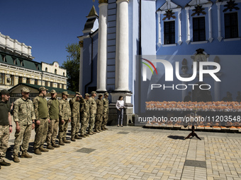 Ukrainian soldiers are attending an Orthodox service before delivering Easter cakes to their fellow servicemen at the front for Orthodox Eas...