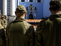 Ukrainian soldiers are attending an Orthodox service before delivering Easter cakes to their fellow servicemen at the front for Orthodox Eas...