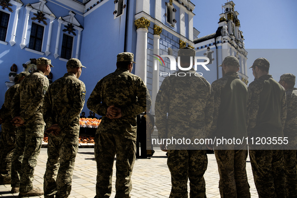 Ukrainian soldiers are attending an Orthodox service before delivering Easter cakes to their fellow servicemen at the front for Orthodox Eas...