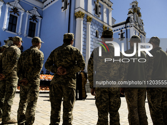 Ukrainian soldiers are attending an Orthodox service before delivering Easter cakes to their fellow servicemen at the front for Orthodox Eas...