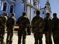 Ukrainian soldiers are attending an Orthodox service before delivering Easter cakes to their fellow servicemen at the front for Orthodox Eas...