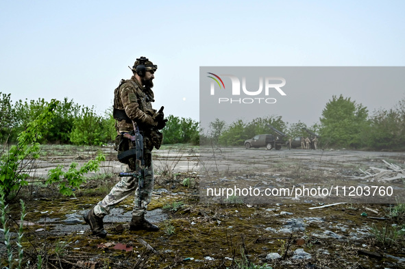 A serviceman from the Steppe Wolves all-volunteer unit is being pictured in Zaporizhzhia Region, southeastern Ukraine, on April 27, 2024. NO...