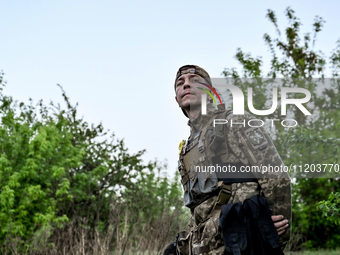 A serviceman from the Steppe Wolves all-volunteer unit is being pictured in Zaporizhzhia Region, southeastern Ukraine, on April 27, 2024. NO...