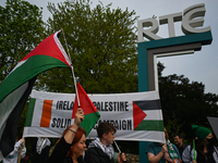 DUBLIN, IRELAND - MAY 2:
Pro-Palestinian activists and Irish musicians stand in solidarity outside RTE's studios, urging Ireland's national...