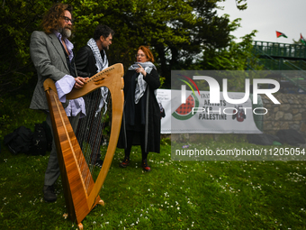 DUBLIN, IRELAND - MAY 2:
Renowned Irish musicians Liam O’Maonlai, Steve Wall, and Mary Coughlan stand in solidarity outside RTE's studios, u...