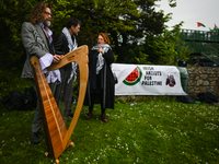 DUBLIN, IRELAND - MAY 2:
Renowned Irish musicians Liam O’Maonlai, Steve Wall, and Mary Coughlan stand in solidarity outside RTE's studios, u...