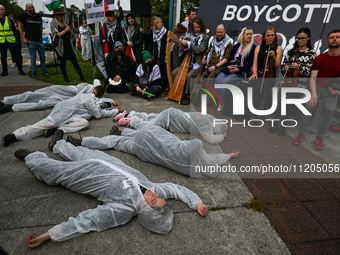 DUBLIN, IRELAND - MAY 2:
Pro-Palestinian activists and Irish musicians stand in solidarity outside RTE's studios, urging Ireland's national...