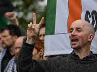 DUBLIN, IRELAND - MAY 2:
Pro-Palestinian activists and Irish musicians stand in solidarity outside RTE's studios, urging Ireland's national...