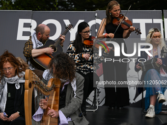 DUBLIN, IRELAND - MAY 2:
Irish musicians stand in solidarity outside RTE's studios, urging Ireland's national broadcaster to boycott the 202...