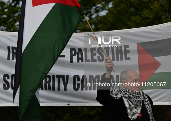 DUBLIN, IRELAND - MAY 2:
Pro-Palestinian activist stands in solidarity outside RTE's studios, urging Ireland's national broadcaster to boyco...