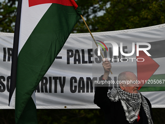 DUBLIN, IRELAND - MAY 2:
Pro-Palestinian activist stands in solidarity outside RTE's studios, urging Ireland's national broadcaster to boyco...