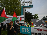 DUBLIN, IRELAND - MAY 2:
Pro-Palestinian activists and Irish musicians stand in solidarity outside RTE's studios, urging Ireland's national...