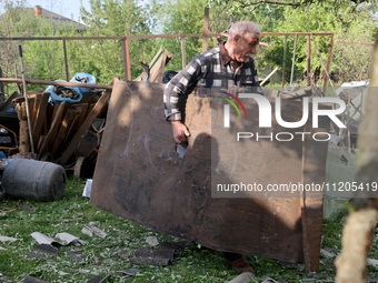 A 75-year-old local resident, Anatolii Staroselets, is suffering from injuries caused by Russian shelling with KAB guided aerial bombs in De...