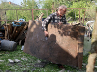 A 75-year-old local resident, Anatolii Staroselets, is suffering from injuries caused by Russian shelling with KAB guided aerial bombs in De...